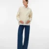 Hoher Kragen, elastische Bündchen, verstellbare Träger, voluminöse Ärmel, Jacke